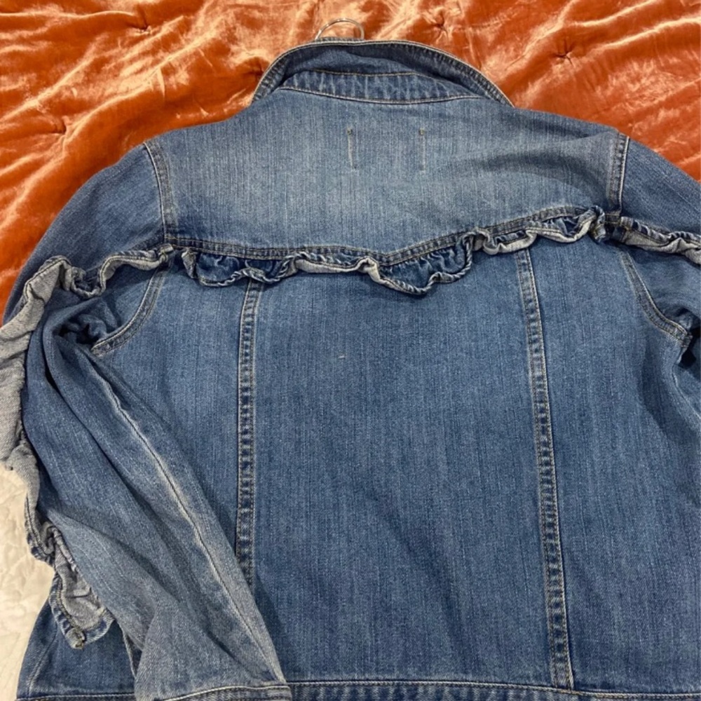 Size small denim jacket with ruffle details